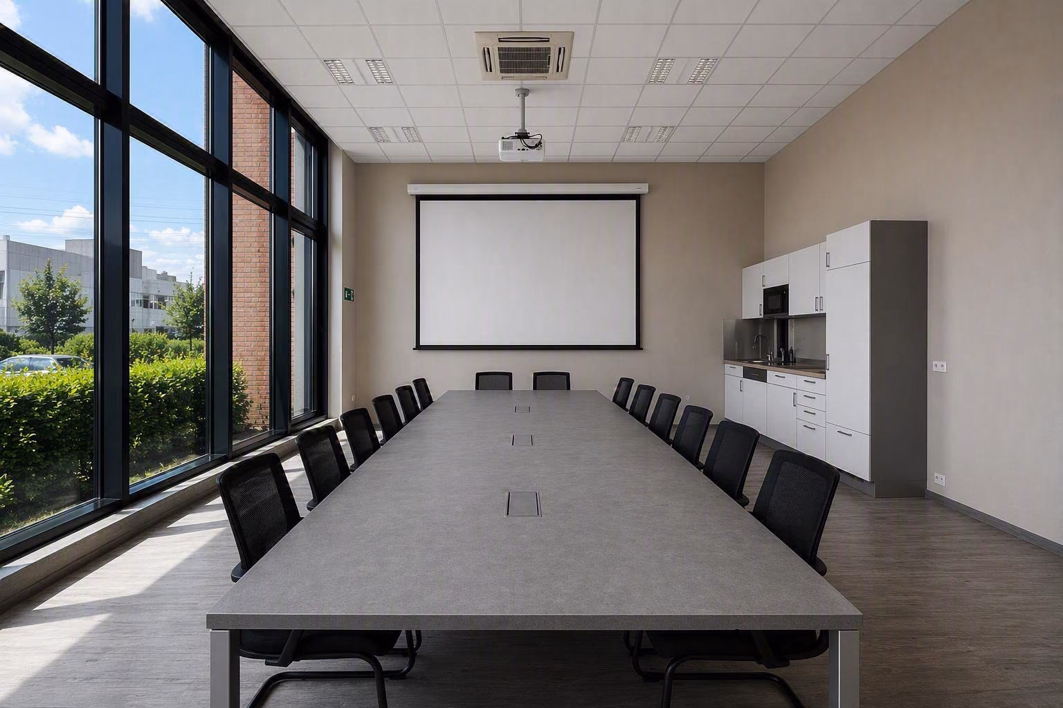 Besprechungsraum 1 im COWORX Paderborn – Tagungsraum für bis zu 20 Personen mit eigener Küchenzeile und Präsentationstechnik. Fotomontage: Dieses Bild zeigt eine virtuelle Visualisierung des möglichen Endergebnisses.